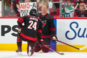 Apr 2, 2026; Raleigh, North Carolina, USA;  Carolina Hurricanes center Jordan Staal (11) talks to center Seth Jarvis (24) before the start of his 1,400 game against the Columbus Blue Jackets at Lenovo Center. Mandatory Credit: James Guillory-Imagn Images