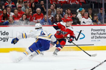 Apr 4, 2026; Washington, District of Columbia, USA; Washington Capitals right wing Anthony Beauvillier (72) skates with the puck as Buffalo Sabres defenseman Bowen Byram (4) defends during the third period at Capital One Arena. Mandatory Credit: Geoff Burke-Imagn Images