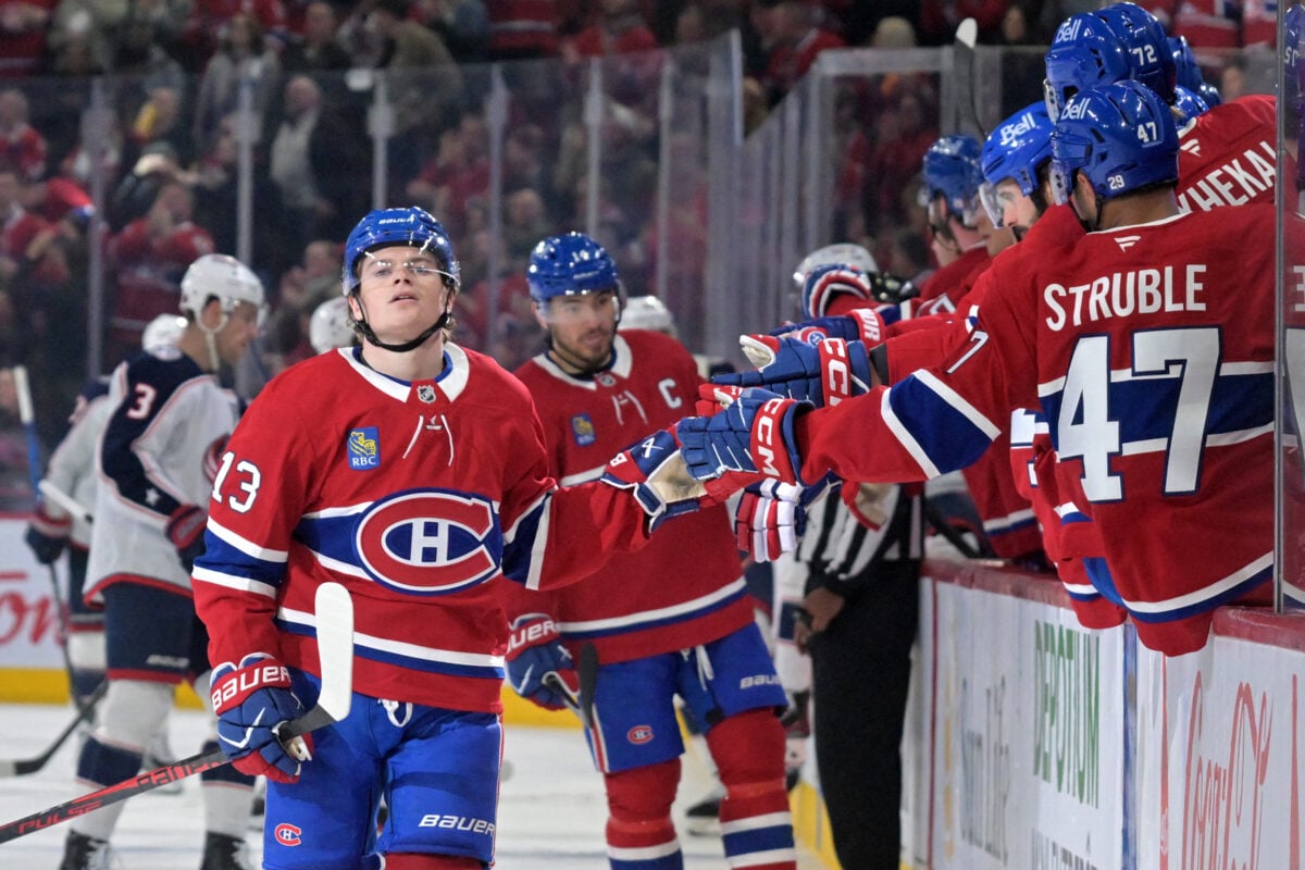 Apr 11, 2026; Montreal, Quebec, CAN; Montreal Canadiens forward Cole Caufield (13) celebrates with teammates after scoring a goal against the Columbus Blue Jackets during the third period at the Bell Centre. Mandatory Credit: Eric Bolte-Imagn Images