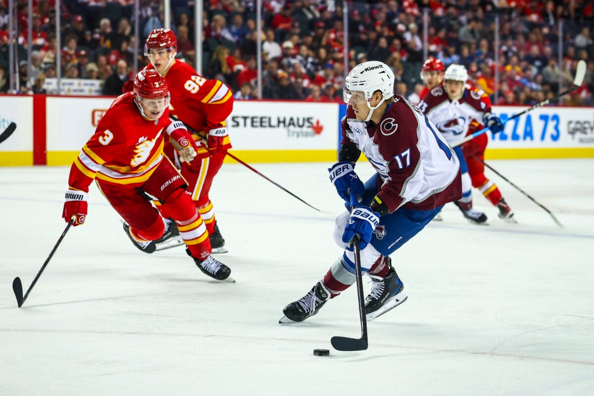 Apr 14, 2026; Calgary, Alberta, CAN; Colorado Avalanche center Parker Kelly (17) controls the puck against the Calgary Flames during the third period at Scotiabank Saddledome. Mandatory Credit: Sergei Belski-Imagn Images