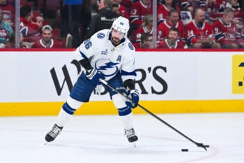 Apr 26, 2026; Montreal, Quebec, CAN; Tampa Bay Lightning right wing Nikita Kucherov (86) plays with a puck during warm-up before the game against the Montreal Canadiens in game four of the first round of the 2026 Stanley Cup Playoffs at Bell Centre. Mandatory Credit: David Kirouac-Imagn Images
