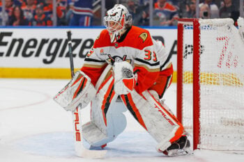 Apr 28, 2026; Edmonton, Alberta, CAN; Anaheim Ducks goaltender Ville Husso (33) looks for a loose puck against the Edmonton Oilers in game five of the first round of the 2026 Stanley Cup Playoffs at Rogers Place. Mandatory Credit: Perry Nelson-Imagn Images