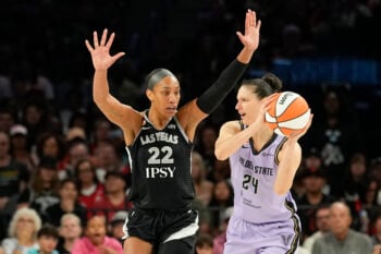 Jun 21, 2026; Las Vegas, Nevada, USA; Golden State Valkyries forward Cecilia Zandalasini (24) controls the ball against Las Vegas Aces center A'ja Wilson (22) during the second quarter of a WNBA basketball game at Michelob Ultra Arena. Mandatory Credit: Lucas Peltier-Imagn Images