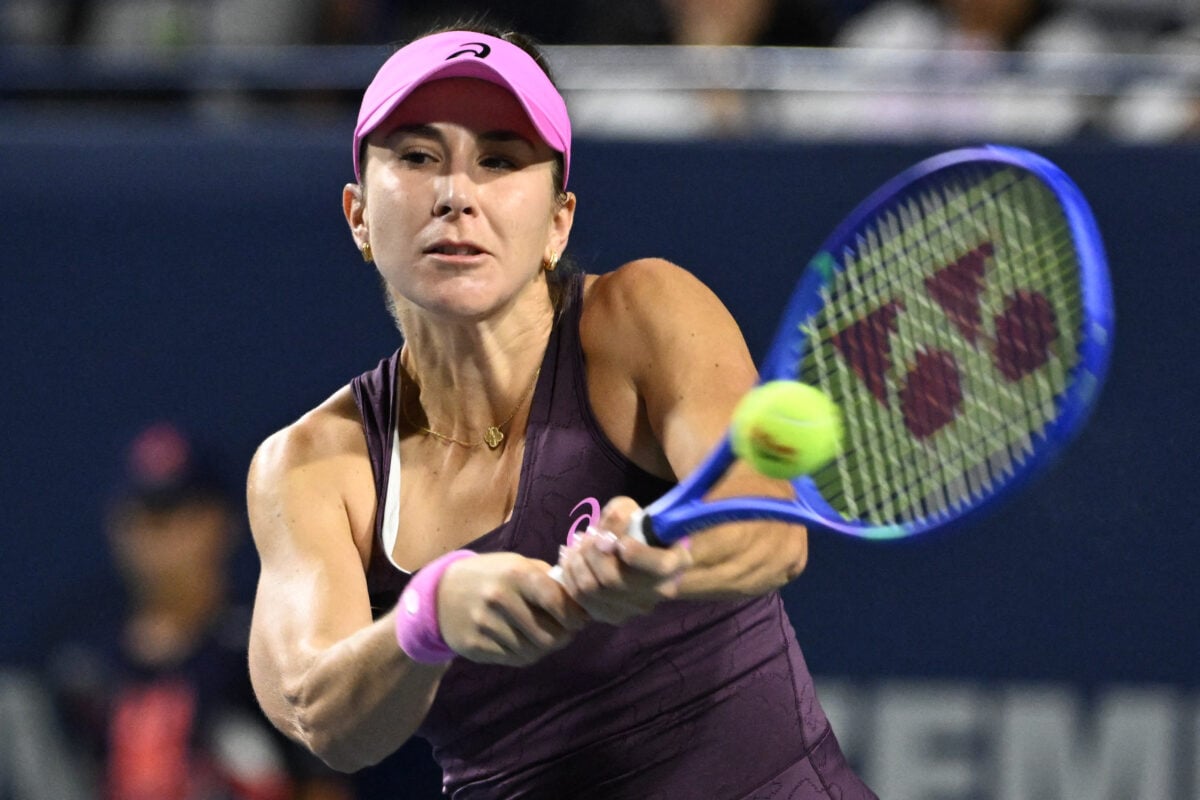 Aug 9, 2026; Toronto, Ontario, Canada; Belinda Bencic (SUI) plays a shot against Alexandra Eala (PHI) during fourth round play at Sobeys Stadium. Mandatory Credit: Dan Hamilton-Imagn Images