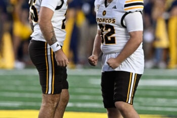 Sep 5, 2026; Ann Arbor, Michigan, USA;  Western Michigan Broncos kicker Dieter Kelly (32) celebrates with holder Ryan Millmore (25) after making a field goal against Michigan in the first quarter at Michigan Stadium.  Mandatory Credit: Lon Horwedel-Imagn Images