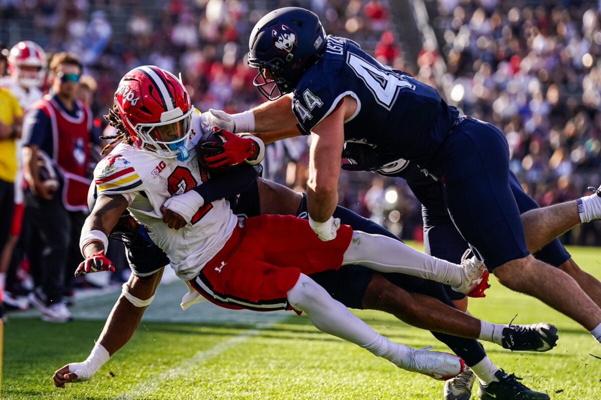 Sep 12, 2026; East Hartford, Connecticut, USA; Maryland Terrapins running back Iverson Howard (24) makes the catch against the UConn Huskies in the first half at Pratt & Whitney Stadium at Rentschler Field. Mandatory Credit: David Butler II-Imagn Images