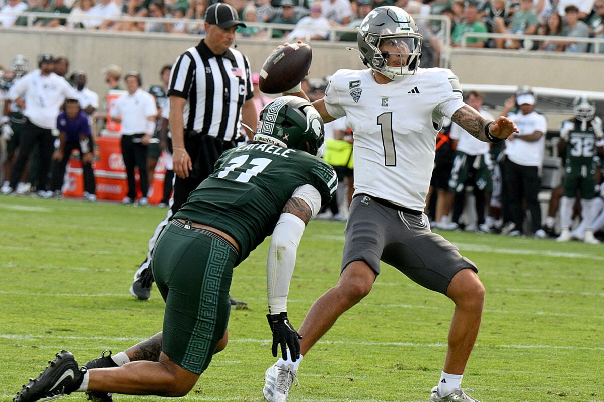 Sep 12, 2026; East Lansing, Michigan, USA;  Michigan State Spartans defensive lineman Anelu Lafaele (11) pressures Eastern Michigan Eagles quarterback Noah Kim (1) during the fourth quarter at Spartan Stadium.  Mandatory Credit: Dale Young-Imagn Images