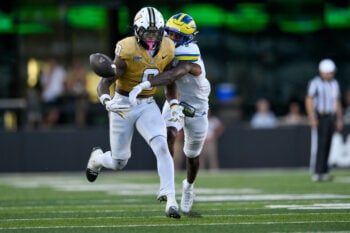 Sep 12, 2026; Nashville, Tennessee, USA;  Delaware Blue Hens cornerback Jaquise Alexander (8) breaks up the pass thrown to Vanderbilt Commodores wide receiver Junior Sherrill (0) during the second half at FirstBank Stadium. Mandatory Credit: Steve Roberts-Imagn Images