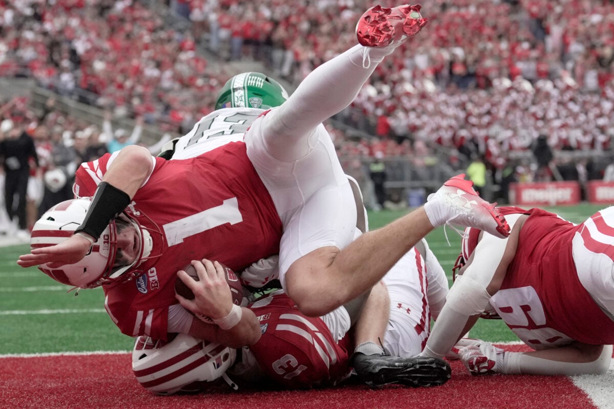 Wisconsin quarterback Colton Joseph (1) lands in the end zone for a touchdown after a 4-yard run during the second quarter against Eastern Michigan on Saturday, Sept. 19 at Camp Randall Stadium in Madison.