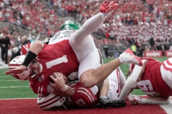 Wisconsin quarterback Colton Joseph (1) lands in the end zone for a touchdown after a 4-yard run during the second quarter against Eastern Michigan on Saturday, Sept. 19 at Camp Randall Stadium in Madison.