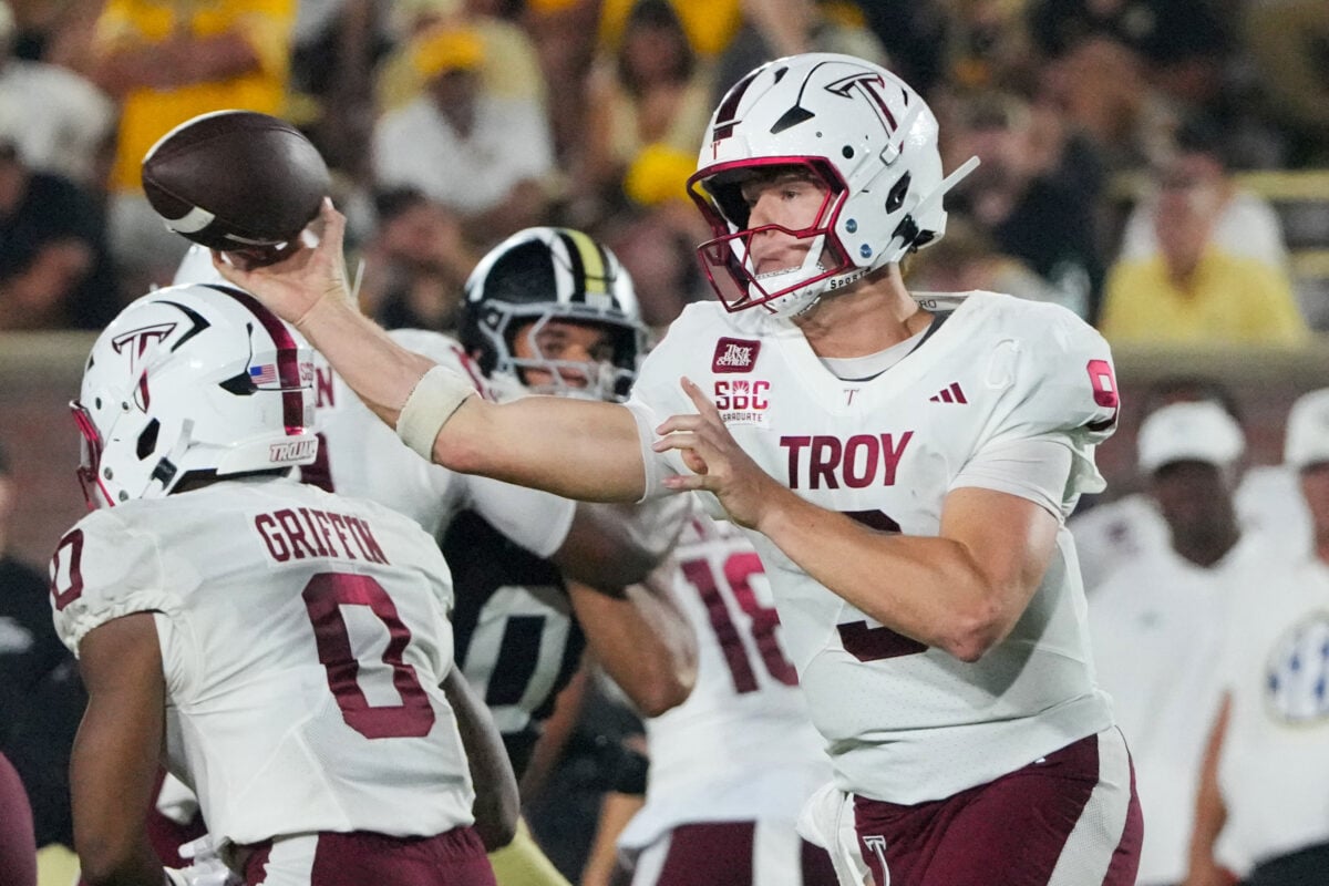 Sep 19, 2026; Columbia, Missouri, USA; Troy Trojans running back Gavin Griffin (0) throws a pass against the Missouri Tigers during the second half of the game at Faurot Field at Memorial Stadium. Mandatory Credit: Denny Medley-Imagn Images