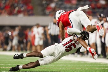 Sep 19, 2026; Tucson, Arizona, USA;  Northern Illinois Huskies safety Kyon Conyers (16) tackles the Arizona Wildcats during the first quarter of the game at Casino Del Sol Stadium.  Mandatory Credit: Aryanna Frank-Imagn Images
