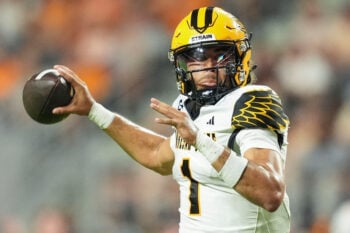 Kennesaw State quarterback Rickie Collins (1) drops back to pass during a college football game against Tennessee on Sept. 19, 2026, in Knoxville, Tennessee.