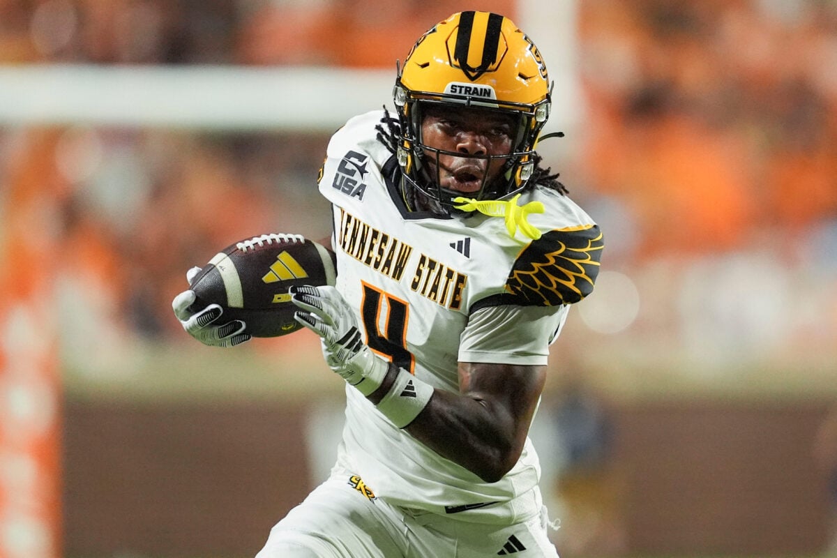 Kennesaw State wide receiver Zion Booker (4) carries the ball during a college football game against Tennessee on Sept. 19, 2026, in Knoxville, Tennessee.