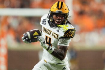 Kennesaw State wide receiver Zion Booker (4) carries the ball during a college football game against Tennessee on Sept. 19, 2026, in Knoxville, Tennessee.