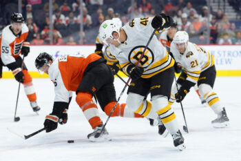 Sep 24, 2026; Philadelphia, Pennsylvania, USA; Boston Bruins left wing Brian Halonen (48) battles for the puck against the Philadelphia Flyers in the first period at Xfinity Mobile Arena. Mandatory Credit: Kyle Ross-Imagn Images