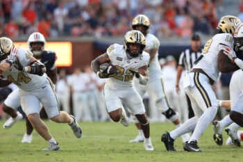 Sep 26, 2026; Auburn, Alabama, USA;  Vanderbilt Commodores quarterback Jared Curtis (2) breaks loose for a run against the Auburn Tigers during the second half Jordan-Hare Stadium.  The kick was good.  Mandatory Credit: John Reed-Imagn Images