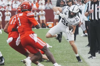 Iowa State running back Aiden Flora (21) battles for extra yards as Utah safety Rabbit Evans (1) and linebacker Cyrus Polu (0) attempt to bring him down during the fourth quarter on Sept. 26, 2026, at Jack Trice Stadium in Ames.