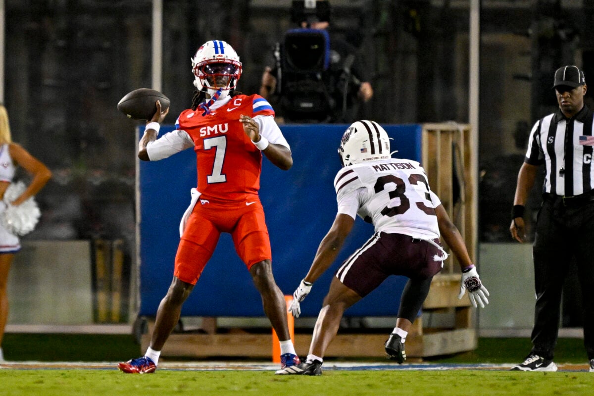 Sep 26, 2026; Dallas, Texas, USA; SMU Mustangs quarterback Kevin Jennings (7) throws the ball over Missouri State Bears safety Anthony Mattison (33) during the first half at Gerald J. Ford Stadium. Mandatory Credit: Jerome Miron-Imagn Images