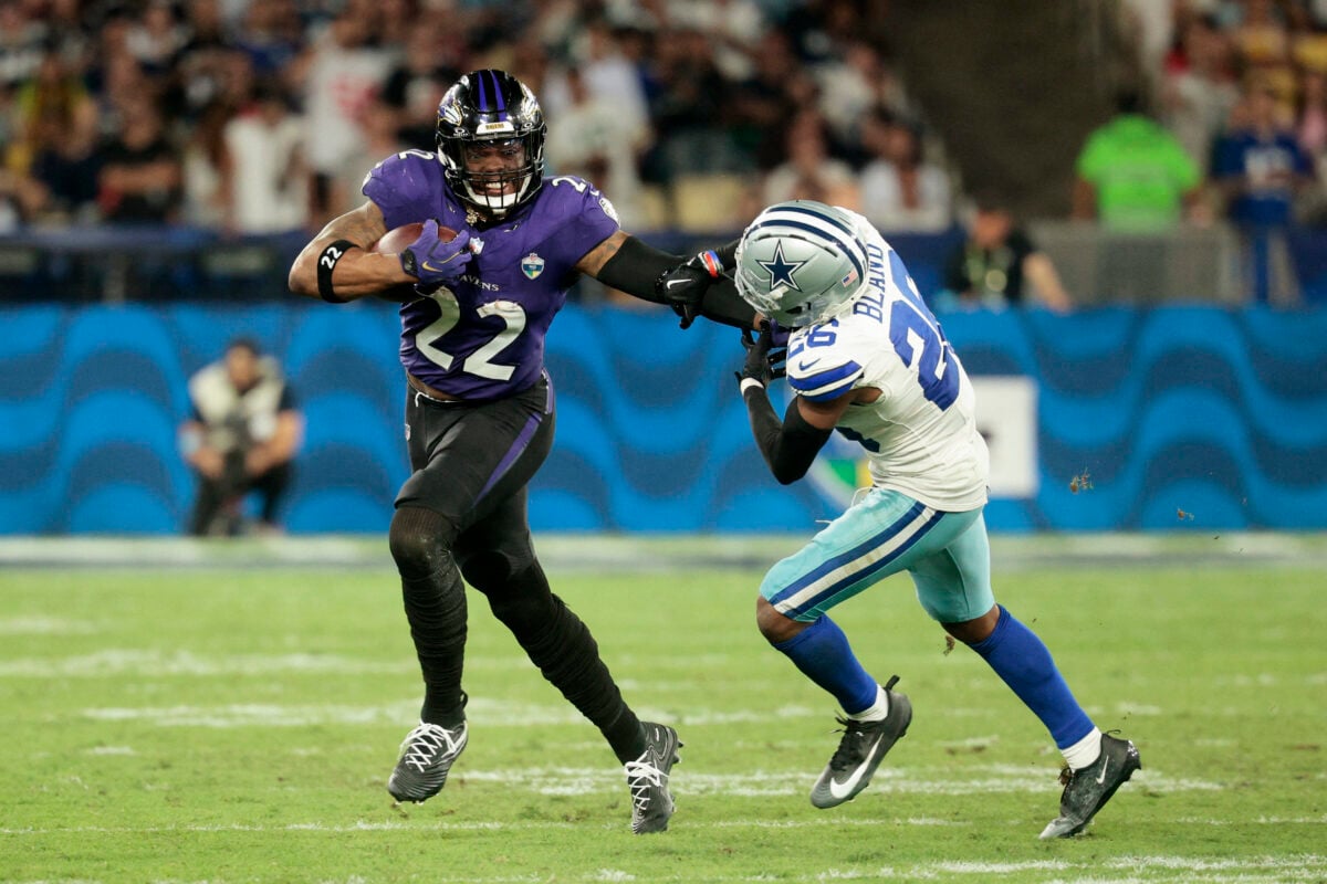 Football - NFL - Baltimore Ravens v Dallas Cowboys - Estadio Maracana, Rio de Janeiro, Brazil - September 27, 2026 Baltimore Ravens' Derrick Henry in action with Dallas Cowboys' DaRon Bland REUTERS/Brian Snyder