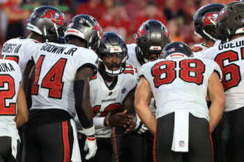 Sep 27, 2026; Tampa, Florida, USA;  Tampa Bay Buccaneers quarterback Jalon Daniels (10) huddles up with teammates during the fourth quarter against the Minnesota Vikings at Raymond James Stadium.  Mandatory Credit: Kim Klement Neitzel-Imagn Images