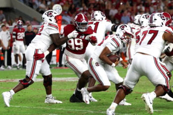 Sep 26, 2026; Tuscaloosa, Alabama, USA; Alabama Crimson Tide defensive lineman Terrance Green (99) pursues South Carolina Gamecocks quarterback LaNorris Sellers (16) during the second half at Saban Field at Bryant-Denny Stadium. Mandatory Credit: David Leong-Imagn Images