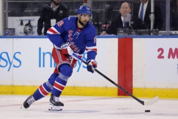 Oct 1, 2026; New York, New York, USA; New York Rangers center Joseph Veleno (90) brings the puck up ice against the Tampa Bay Lightning during the third period at Madison Square Garden. Mandatory Credit: Brad Penner-Imagn Images