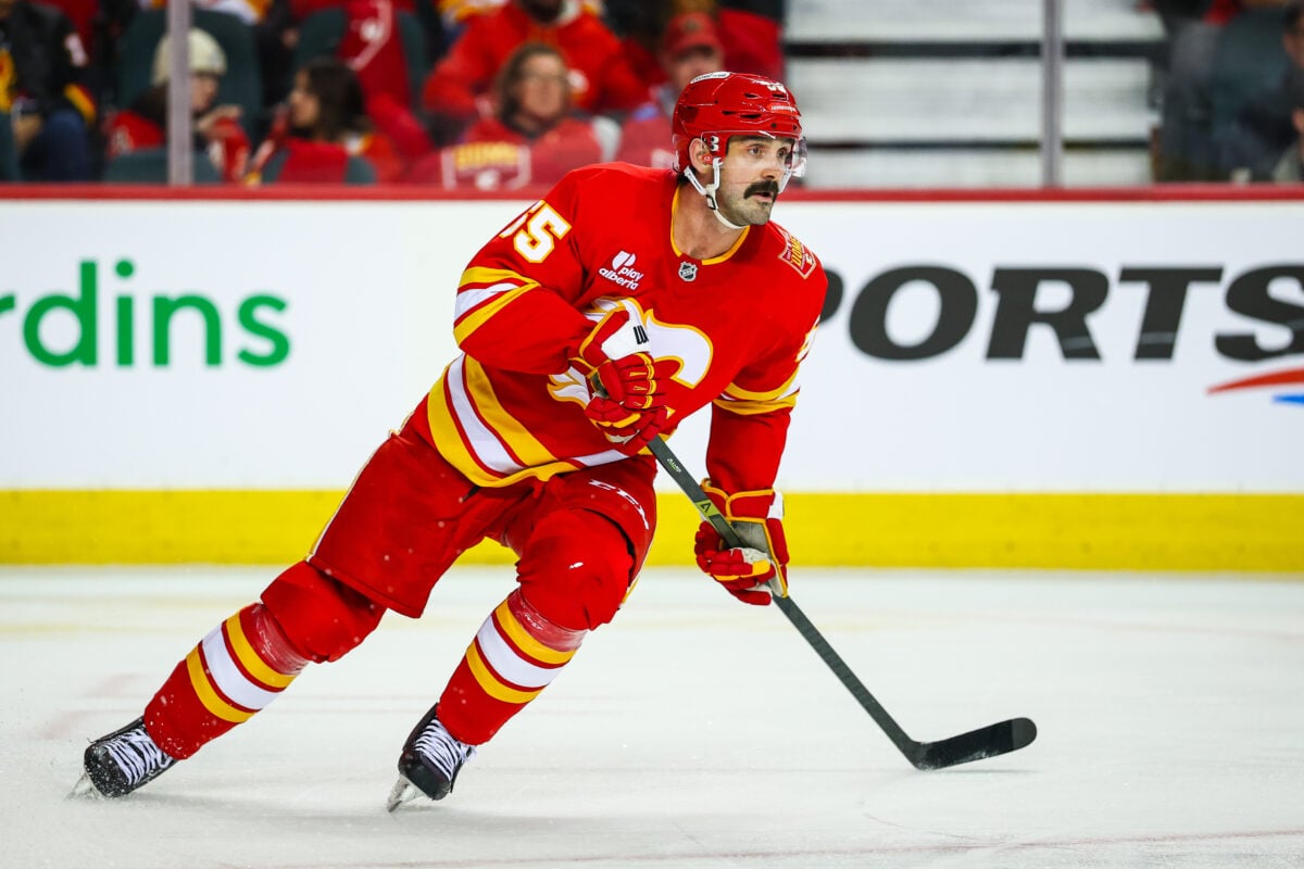 Oct 1, 2026; Calgary, Alberta, CAN; Calgary Flames defenseman Jake Middleton (55) skates against the Seattle Kraken during the third period at Scotiabank Saddledome. Mandatory Credit: Sergei Belski-Imagn Images