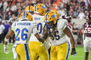 Oct 2, 2026; Blacksburg, Virginia, USA;  Pittsburgh Panthers offensive lineman BJ Williams (55) congratulates Pittsburgh Panthers running back Damon Ferguson Jr. (26) on a touchdown during the third quarter against the Virginia Tech Hokies at Lane Stadium.  Mandatory Credit: Brian Bishop-Imagn Images