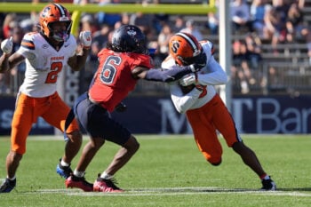 Oct 3, 2026; East Hartford, Connecticut, USA;  Syracuse Orange wide receiver Darius Johnson (6) runs with the ball against Connecticut Huskies defensive back Renick Dorilas (6) during the second half at Pratt & Whitney Stadium at Rentschler Field.  Mandatory Credit: Gregory Fisher-Imagn Images