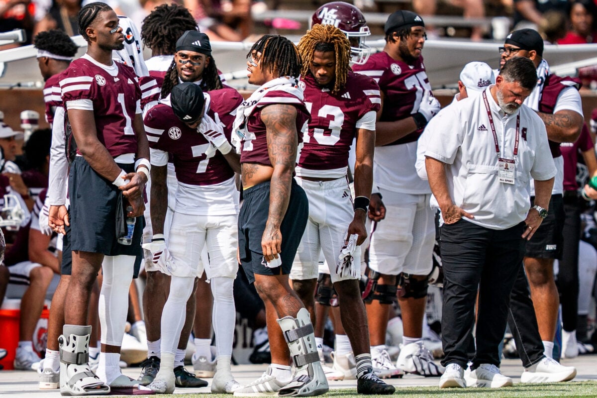 Mississippi State quarterback Kamario Taylor (1) talks with wide receiver Zion Ragins (7) and running back Fluff Bothwell (24) on the sideline during a college football game between Mississippi State and Alabama at Davis Wade Stadium in Starkville, Miss., on Saturday, Oct. 3, 2026. Alabama defeated Mississippi State 56-23. Taylor and Bothwell were both taken out of the game for injuries.