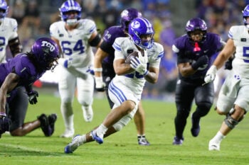 Oct 3, 2026; Fort Worth, Texas, USA;  BYU Cougars running back Journee Tonga (20) carries the ball against the TCU Horned Frogs during the second half at Amon G. Carter Stadium.  Mandatory Credit: Chris Jones-Imagn Images