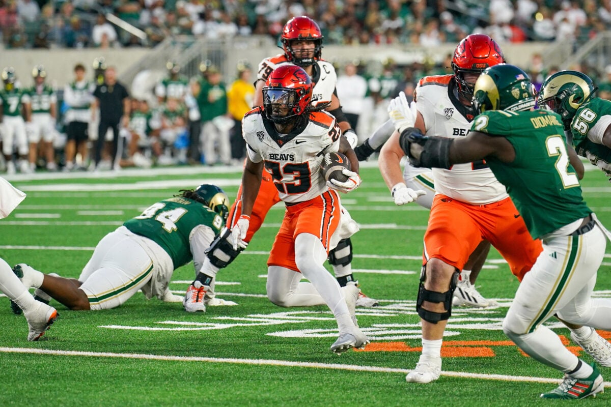 Oct 3, 2026; Fort Collins, Colorado, USA;  Oregon State Beavers running back AJ Newberry (23) runs the ball against the Colorado State Rams in the second half at Sonny Lubick Field at Canvas Stadium.  Mandatory Credit: Andrew Rydland-Imagn Images