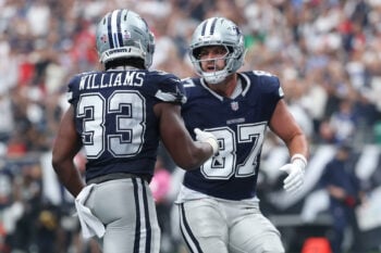 Oct 4, 2026; Houston, Texas, USA;  Dallas Cowboys running back Javonte Williams (33) reacts with tight end Jake Ferguson (87) after scoring a touchdown against the Houston Texans during the second half at Reliant Stadium.  Mandatory Credit: Troy Taormina-Imagn Images