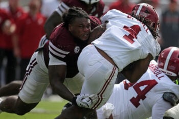 Oct 3, 2026; Starkville, Mississippi, USA; Mississippi State Bulldogs defensive lineman Jaray Bledsoe (9) tackles Alabama Crimson Tide running back Daniel Hill (4) during the second quarter at Davis Wade Stadium at Scott Field. Mandatory Credit: Petre Thomas-Imagn Images