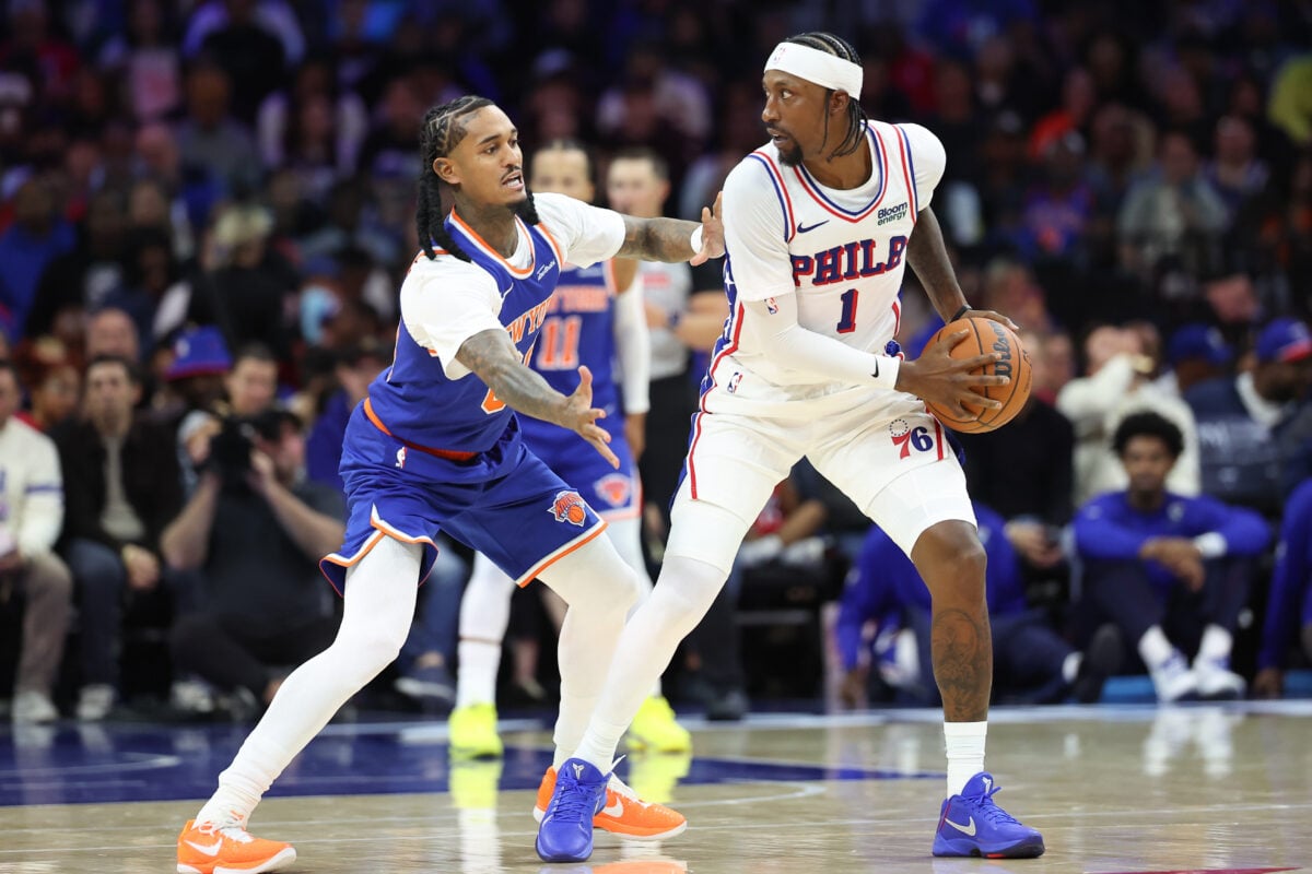 Oct 5, 2026; Philadelphia, Pennsylvania, USA; Philadelphia 76ers guard Kentavious Caldwell-Pope (1) controls the ball against New York Knicks guard Jordan Clarkson (00) during the second quarter at Xfinity Mobile Arena. Mandatory Credit: Bill Streicher-Imagn Images