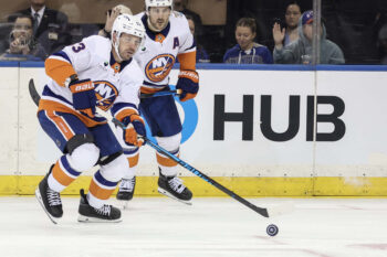 Oct 6, 2026; New York, New York, USA;  New York Islanders center Casey Cizikas (53) chases after the puck in the third period against the New York Rangers at Madison Square Garden.  Mandatory Credit: Wendell Cruz-Imagn Images