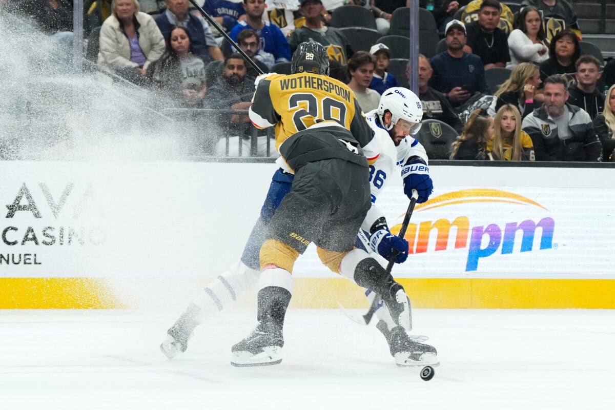 Oct 8, 2026; Las Vegas, Nevada, USA;  Toronto Maple Leafs right wing Kirill Marchenko (86) shoots around Vegas Golden Knights defenseman Parker Wotherspoon (29) during the second period at T-Mobile Arena.  Mandatory Credit: Candice Ward-Imagn Images