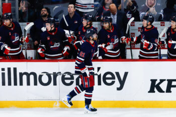 Oct 9, 2026; Winnipeg, Manitoba, CAN;  Winnipeg Jets forward Kyle Connor (81) is congratulated by his teammates on his goal on Anaheim Ducks goalie Lukas Dostal (1) during the third period at Canada Life Centre.  Mandatory Credit: Terrence Lee-Imagn Images