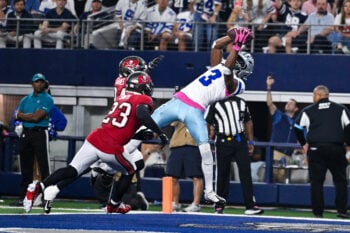 Oct 8, 2026; Arlington, Texas, USA; Dallas Cowboys wide receiver George Pickens (3) catches a touchdown pass over Tampa Bay Buccaneers safety Tykee Smith (23) and cornerback Ayden Garnes (24) during the game between the Cowboys and the Buccaneers at AT&T Stadium. Mandatory Credit: Jerome Miron-Imagn Images