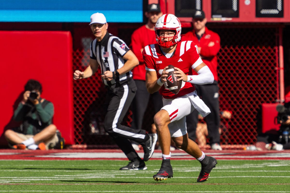 Oct 10, 2026; Lincoln, Nebraska, USA;  Nebraska Cornhuskers quarterback Anthony Colandrea (10) scrambles against the Indiana Hoosiers during the first quarter at Memorial Stadium.  Mandatory Credit: Dylan Widger-Imagn Images