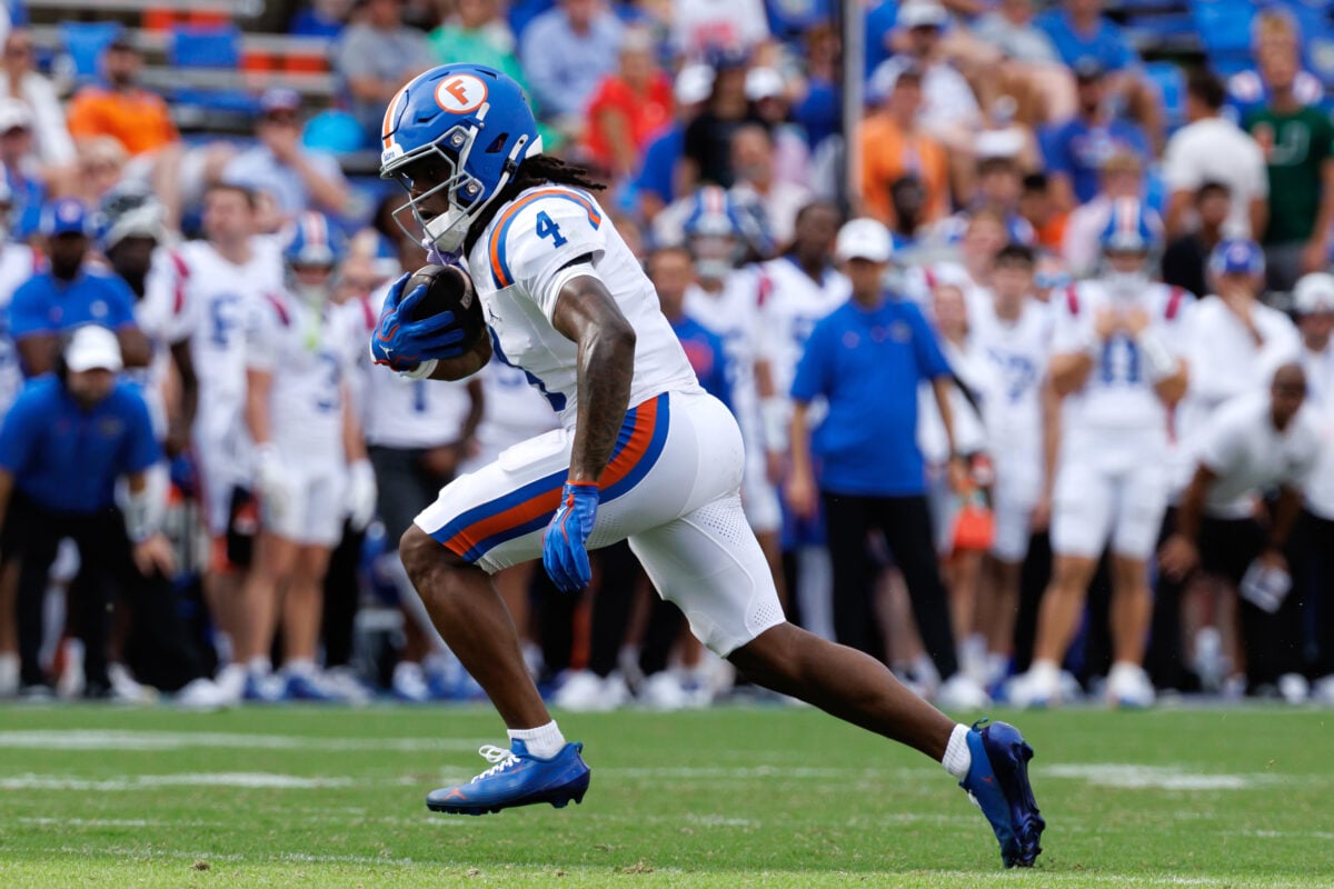 Oct 10, 2026; Gainesville, Florida, USA;  Florida Gators wide receiver TJ Abrams (4) runs with the ball against the South Carolina Gamecocks during the second half at Ben Hill Griffin Stadium.  Mandatory Credit: Matt Pendleton-Imagn Images