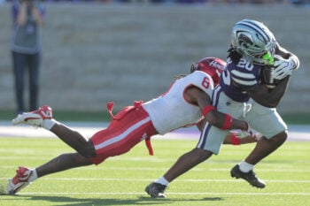 Kansas State Wildcats running back Rodney Fields Jr. (20) is tackled by Houston Cougars defensive back Kentrell Webb (8) during the game inside Bill Snyder Family Stadium in Manhattan, Kansas, on Oct. 10, 2026.