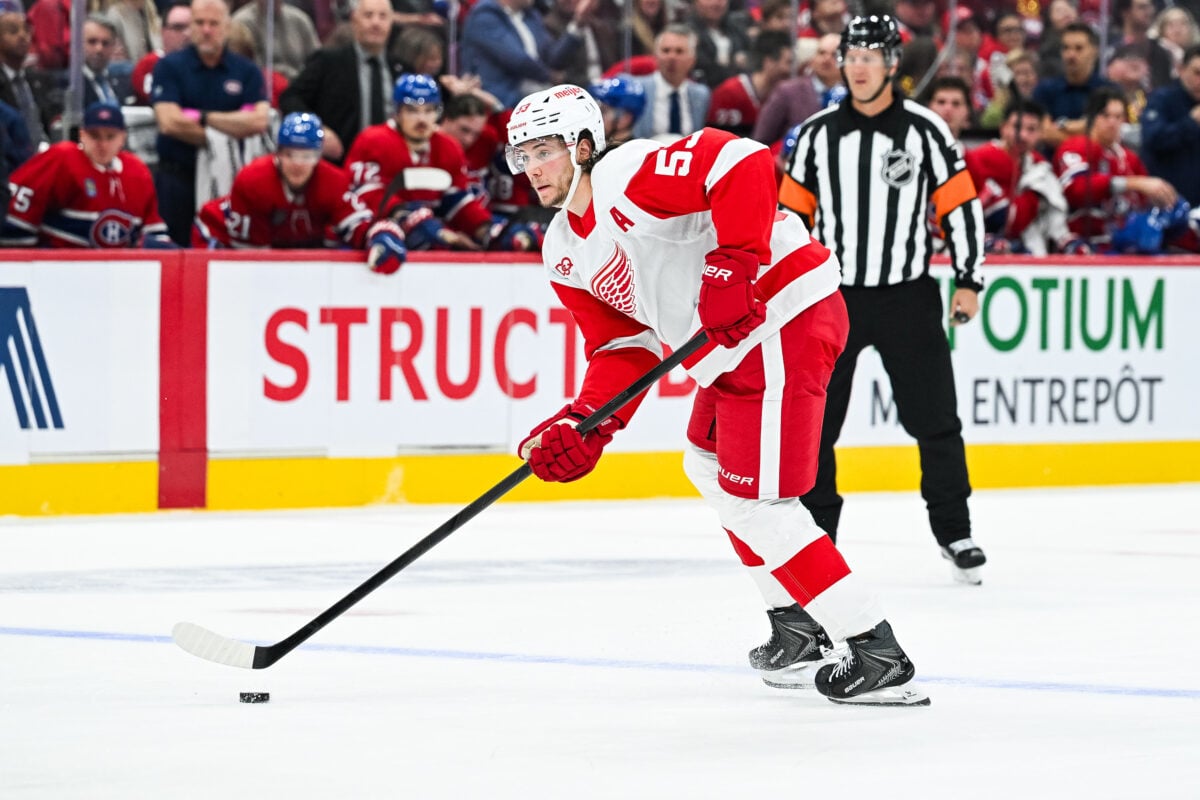 Oct 10, 2026; Montreal, Quebec, CAN; Detroit Red Wings defenseman Moritz Seider (53) plays the puck against the Montreal Canadiens during the second period at Bell Centre. Mandatory Credit: David Kirouac-Imagn Images