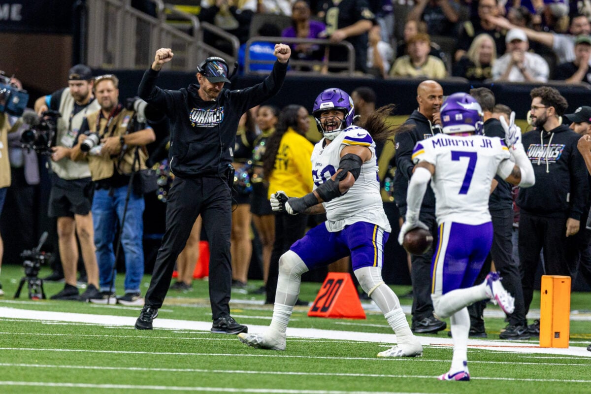 Oct 11, 2026; New Orleans, Louisiana, USA;  Minnesota Vikings cornerback Byron Murphy (7) intercepts a pass against New Orleans Saints wide receiver Chris Olave (12) during the second half at Caesars Superdome.  Mandatory Credit: Stephen Lew-Imagn Images