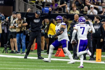 Oct 11, 2026; New Orleans, Louisiana, USA;  Minnesota Vikings cornerback Byron Murphy (7) intercepts a pass against New Orleans Saints wide receiver Chris Olave (12) during the second half at Caesars Superdome.  Mandatory Credit: Stephen Lew-Imagn Images