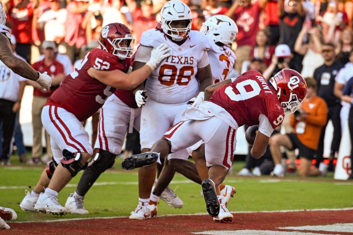 Oct 10, 2026; Dallas, Texas, USA; Oklahoma Sooners running back Lloyd Avant (9) scores a touchdown against the Texas Longhorns during the game between the Sooners and the Longhorns at Cotton Bowl. Mandatory Credit: Jerome Miron-Imagn Images