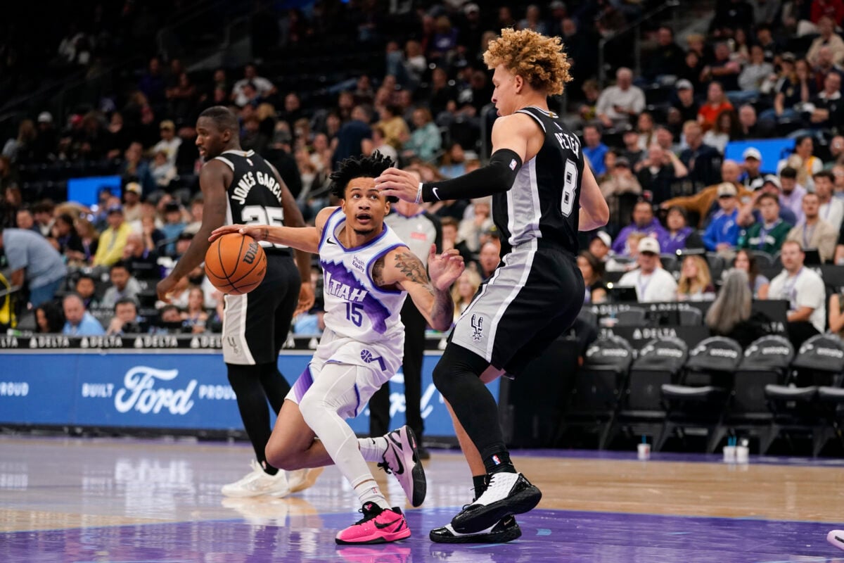 Oct 12, 2026; Salt Lake City, Utah, USA; Utah Jazz guard Trey Alexander (15) dribbles against San Antonio Spurs guard Taelon Peter (8) during the second half at Delta Center. Mandatory Credit: Aaron Baker-Imagn Images