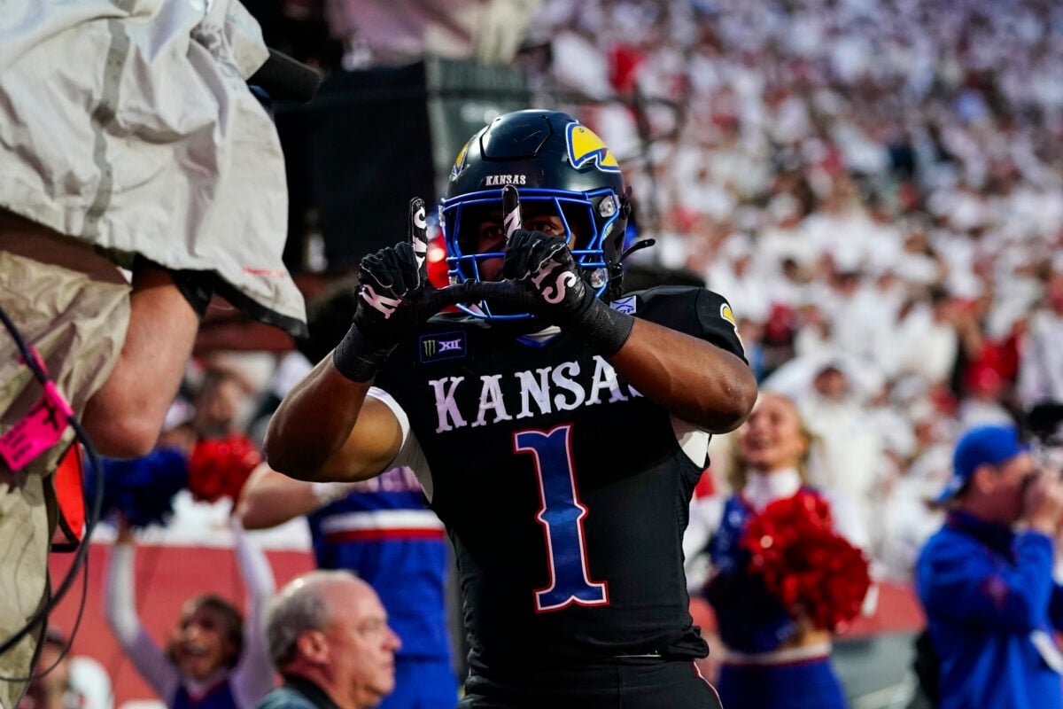 Oct 10, 2026; Salt Lake City, Utah, USA; Kansas Jayhawks running back Dylan Edwards (1) celebrates a first half touchdown against the Utah Utes at Rice-Eccles Stadium. Mandatory Credit: Aaron Baker-Imagn Images