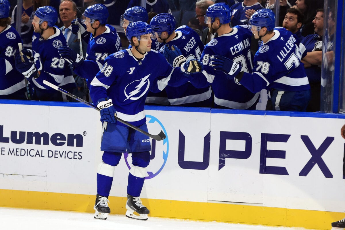 Oct 15, 2026; Tampa, Florida, USA;  Tampa Bay Lightning left wing Brandon Hagel (38) is congratulated after he scored a goal against the Seattle Kraken during the second period at Benchmark International Arena.  Mandatory Credit: Kim Klement Neitzel-Imagn Images